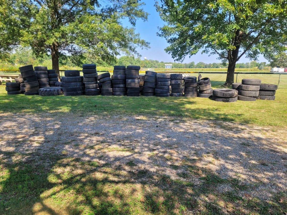 tires wait to be hauled away after a very successful recycle day event